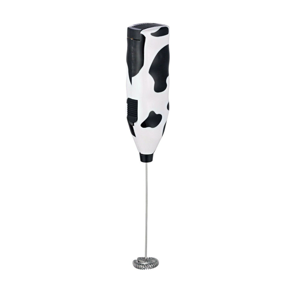 A slender, hand-held milk frother. At the top end, it has a plastic handle with a cow print design. At the opposite end, there&#39;s a whisk or frothing head made of stainless steel for aerating milk and creating froth. 